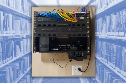 Photo of a network configuration on a background of library shelves.